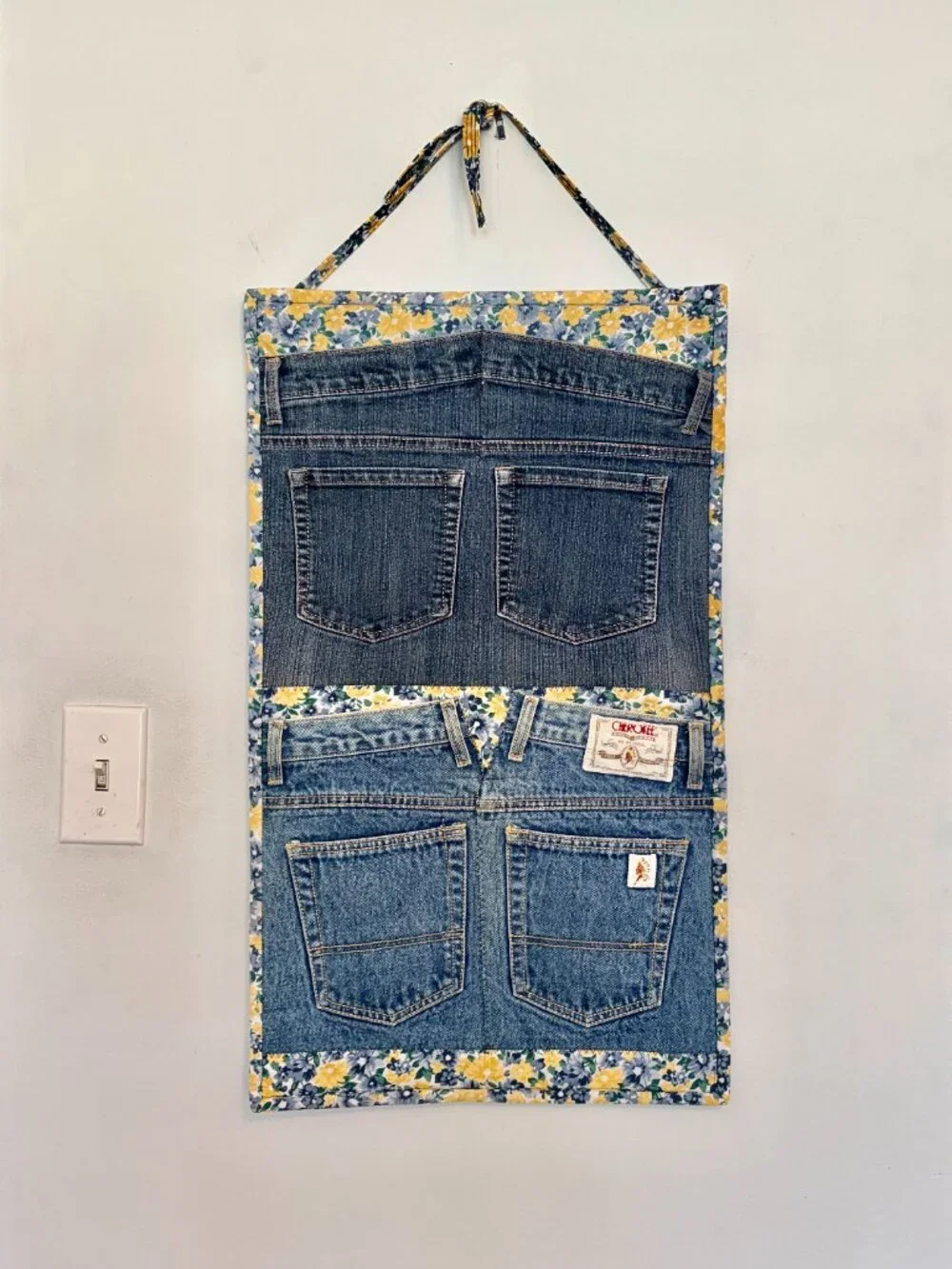 Denim quilt wall organizer with 4 pockets & 6 belt loops